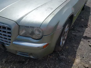 2005 Chrysler 300 with VIN 2C3AA63H65H522824, listed as a IAAI auction lot 42133787 with 266,724 mi miles. Bid and sale history available at carsss.com. Image 14.