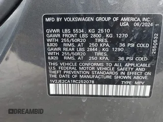 2024 Volkswagen Atlas SE z VIN 1V2JE2CA1RC252078, wystawiony jako IAAI lot #42061482 z przebiegiem 10 396 mil mil oraz . Historia ofert i sprzedaży dostępna na DreamBid. Obrazek 9.