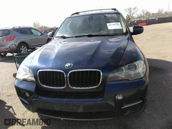 2012 BMW X5 35i с VIN 5UXZV4C5XCL749123, выставлен на аукционе IAAI как лот 41749728 с пробегом 124 193 миль миль и . История ставок и продаж доступна на DreamBid. Изображение 12.