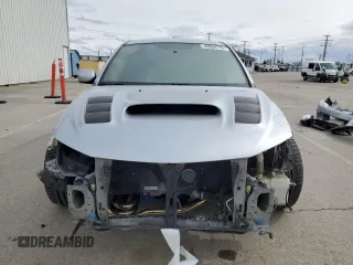 2013 Subaru WRX WRX z VIN JF1GV7E6XDG021012, wystawiony jako Copart lot #49059745 z przebiegiem 154 186 mil mil oraz Szkoda całkowita • Salvage title. Historia ofert i sprzedaży dostępna na DreamBid. Obrazek 5.