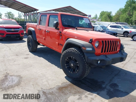 2020 Jeep Gladiator Sport S z VIN 1C6HJTAG0LL149161, wystawiony jako IAAI lot #42071132 z przebiegiem 153 062 mil mil oraz . Historia ofert i sprzedaży dostępna na DreamBid. Obrazek 1.
