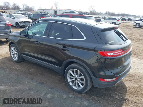2015 Lincoln MKC with VIN 5LMTJ2AH0FUJ04461, listed as a IAAI auction lot 41804169 with 97,187 mi miles. Bid and sale history available at carsss.com. Image 3.
