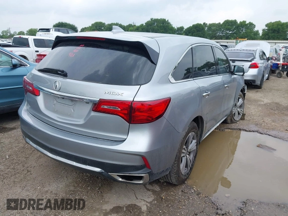 2020 Acura MDX with VIN 5J8YD3H32LL016504, listed as a IAAI auction lot 42126961 with 90,307 mi miles and . Bid and sale history available at DreamBid. Image 4.