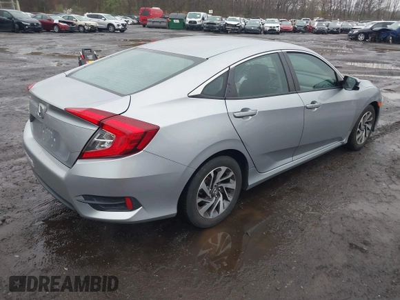 2016 Honda Civic EX with VIN 19XFC2F75GE217935, listed as a IAAI auction lot 41963307 with 87,477 mi miles and . Bid and sale history available at DreamBid. Image 4.