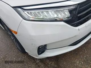 2022 Honda Odyssey EX-L with VIN 5FNRL6H76NB002248, listed as a IAAI auction lot 41818243 with 32,952 mi miles and . Bid and sale history available at DreamBid. Image 17.