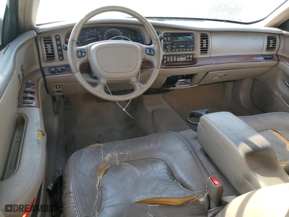 1999 Buick Park Avenue with VIN 1G4CW52K6X4653731, listed as a Copart auction lot 72736444 with 128,471 mi miles and Salvage Title. Bid and sale history available at carsss.com. Image 8.