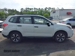 2018 Subaru Forester z VIN JF2SJABC5JH444739, wystawiony jako IAAI lot #42123918 z przebiegiem 124 520 mil mil oraz . Historia ofert i sprzedaży dostępna na DreamBid. Obrazek 14.