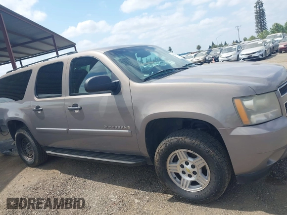 2007 Chevrolet Suburban LT z VIN 1GNFK163X7J289542, wystawiony jako IAAI lot #42054920 z przebiegiem 146 702 mil mil oraz . Historia ofert i sprzedaży dostępna na DreamBid. Obrazek 14.
