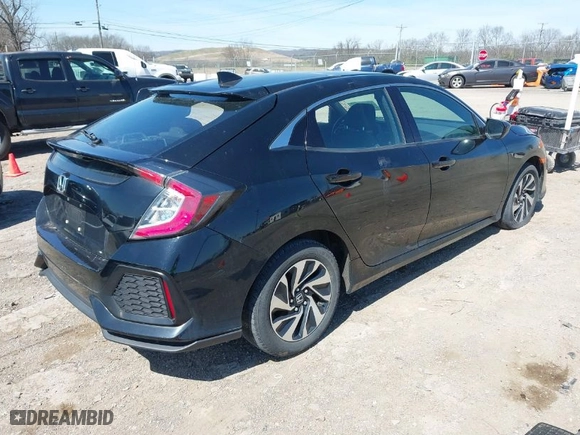 2018 Honda Civic Hatchback LX with VIN SHHFK7H25JU202255, listed as a IAAI auction lot 41864636 with 82,141 mi miles. Bid and sale history available at carsss.com. Image 4.