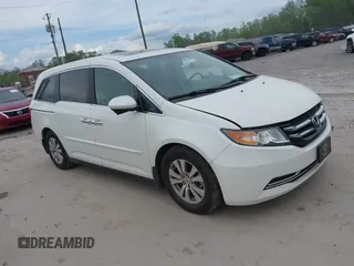 2016 Honda Odyssey EX-L z VIN 5FNRL5H66GB057691, wystawiony jako IAAI lot #42172077 z przebiegiem 98 284 mil mil oraz . Historia ofert i sprzedaży dostępna na DreamBid. Obrazek 1.