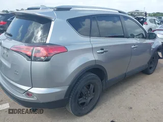2018 Toyota RAV4 LE with VIN 2T3BFREV8JW758553, listed as a IAAI auction lot 42539300 with 116,337 mi miles and . Bid and sale history available at DreamBid. Image 4.