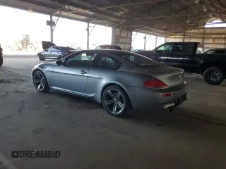2006 BMW M6 with VIN WBSEH934X6B797428, listed as a Copart auction lot 63462135 with 73,393 mi miles and Salvage title. Bid and sale history available at DreamBid. Image 2.