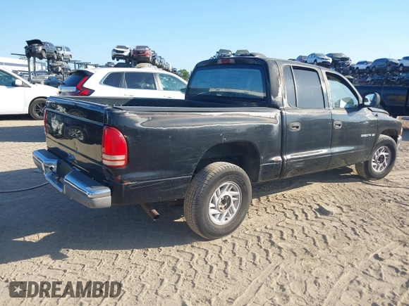 2000 Dodge Dakota Sport with VIN 1B7GL2AN2YS776819, listed as a IAAI auction lot 42066658 with 250,880 mi miles and . Bid and sale history available at carsss.com. Image 4.