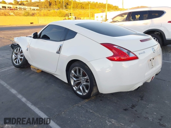 2014 Nissan 370Z Touring с VIN JN1AZ4EH2EM635420, выставлен на аукционе IAAI как лот 40862653 с пробегом 68 004 миль миль и . История ставок и продаж доступна на DreamBid. Изображение 3.