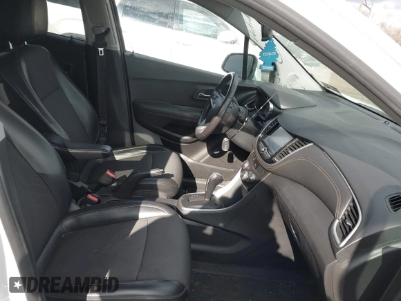 2017 Chevrolet Trax LT z VIN KL7CJPSBXHB215447, wystawiony jako IAAI lot #41665363 z przebiegiem 90 450 mil mil oraz . Historia ofert i sprzedaży dostępna na DreamBid. Obrazek 5.
