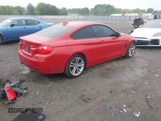 2014 BMW 4 Series 428i xDrive with VIN WBA3N9C57EK245350, listed as a IAAI auction lot 42184111 with 127,908 mi miles and . Bid and sale history available at DreamBid. Image 4.