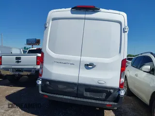 2023 Ford Transit Cargo with VIN 1FTBR1C87PKB05736, listed as a IAAI auction lot 42221931 with 40,248 mi miles and . Bid and sale history available at DreamBid. Image 16.