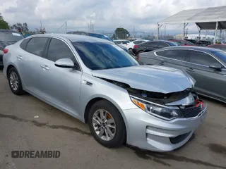 2016 Kia Optima LX with VIN KNAGT4L36G5108717, listed as a IAAI auction lot 41935544 with 137,259 mi miles. Bid and sale history available at carsss.com. Image 1.