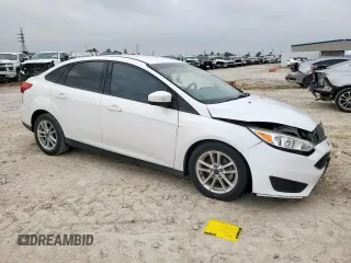2018 Ford Focus SE with VIN 1FADP3F23JL246375, listed as a Copart auction lot 56539005 with 83,130 mi miles and Salvage title. Bid and sale history available at DreamBid. Image 4.