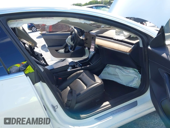 2020 Tesla Model 3 Standard Range Plus with VIN 5YJ3E1EA8LF783631, listed as a IAAI auction lot 40696383 with 78,889 mi miles. Bid and sale history available at carsss.com. Image 5.