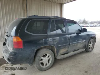 2005 GMC Envoy SLE z VIN 1GKDT13S552130173, wystawiony jako Copart lot #50766595 z przebiegiem Nie podano mil oraz Czysty tytuł • Clean title. Historia ofert i sprzedaży dostępna na DreamBid. Obrazek 3.