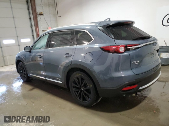 2023 Mazda CX-9 Grand Touring with VIN JM3TCBDY0P0640629, listed as a Copart auction lot 49310145 with 52,425 mi miles and Clean Title. Bid and sale history available at DreamBid. Image 2.