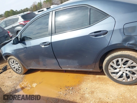 2018 Toyota Corolla L with VIN 5YFBURHE8JP807522, listed as a IAAI auction lot 41609439 with 76,573 mi miles and . Bid and sale history available at DreamBid. Image 14.