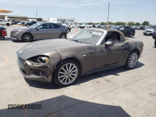 2019 FIAT 124 Spider Urbana Edition z VIN JC1NFAEKXK0142053, wystawiony jako Copart lot #67855644 z przebiegiem 60 666 mil mil oraz Szkoda całkowita • Salvage title. Historia ofert i sprzedaży dostępna na DreamBid. Obrazek 1.
