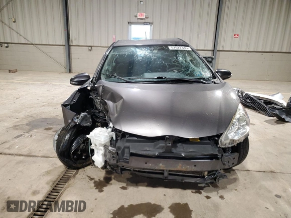 2014 Toyota Prius One z VIN JTDKDTB32E1076293, wystawiony jako Copart lot #57522345 z przebiegiem Nie podano mil oraz Szkoda całkowita • Salvage title. Historia ofert i sprzedaży dostępna na DreamBid. Obrazek 5.