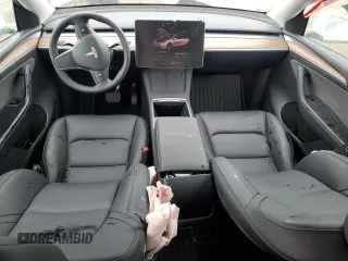 2024 Tesla Model Y Long Range z VIN 7SAYGDEE5RF075756, wystawiony jako Copart lot #48819465 z przebiegiem 10 457 mil mil oraz Szkoda całkowita • Salvage title. Historia ofert i sprzedaży dostępna na DreamBid. Obrazek 8.