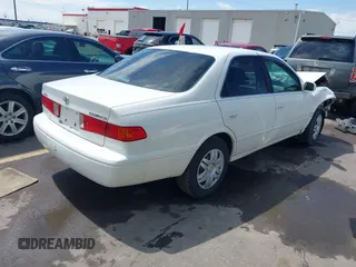 2001 Toyota Camry CE with VIN JT2BG22K210571000, listed as a IAAI auction lot 42061153 with 203,182 mi miles. Bid and sale history available at carsss.com. Image 4.