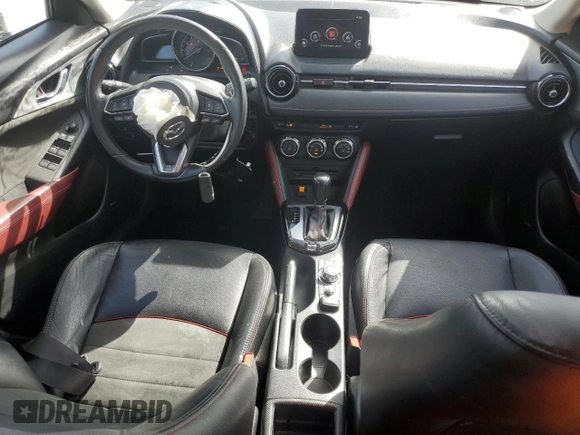 2018 Mazda CX-3 Grand Touring z VIN JM1DKFD79J0329416, wystawiony jako Copart lot #51708325 z przebiegiem 64 597 mil mil oraz Szkody całkowita. Historia ofert i sprzedaży dostępna na DreamBid. Obrazek 8.