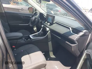 2019 Toyota RAV4 LE with VIN JTMG1RFV9KD014526, listed as a IAAI auction lot 42638858 with 90,995 mi miles and . Bid and sale history available at DreamBid. Image 5.