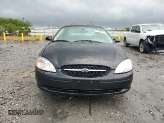 2003 Ford Taurus SEL Deluxe with VIN 1FAHP56S83A225002, listed as a Copart auction lot 49456975 with 199,759 mi miles and Salvage Title. Bid and sale history available at DreamBid. Image 5.