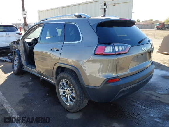 2020 Jeep Cherokee Latitude Plus with VIN 1C4PJLLB5LD521965, listed as a IAAI auction lot 41232028 with 77,729 mi miles. Bid and sale history available at carsss.com. Image 3.