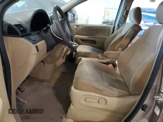 2009 Honda Odyssey EX с VIN 5FNRL38479B019599, выставлен на аукционе Copart как лот 56375175 с пробегом 241 526 миль миль и Списание • Salvage title. История ставок и продаж доступна на DreamBid. Изображение 7.