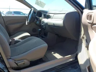 1999 Ford Escort LX with VIN 1FAFP10P3XW287792, listed as a IAAI auction lot 41807938 with 247,141 mi miles. Bid and sale history available at carsss.com. Image 5.