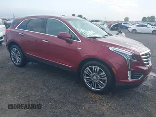 2018 Cadillac XT5 Premium Luxury FWD z VIN 1GYKNERS2JZ242842, wystawiony jako IAAI lot #42297159 z przebiegiem 72 008 mil mil oraz . Historia ofert i sprzedaży dostępna na DreamBid. Obrazek 1.