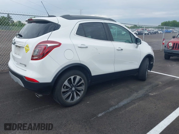 2019 Buick Encore Essence with VIN KL4CJGSM2KB876329, listed as a IAAI auction lot 42101397 with 84,020 mi miles. Bid and sale history available at carsss.com. Image 4.