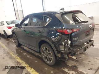2023 Mazda CX-5 2.5 S Premium Plus Package with VIN JM3KFBEM0P0157074, listed as a IAAI auction lot 41215076 with 37,323 mi miles. Bid and sale history available at carsss.com. Image 3.