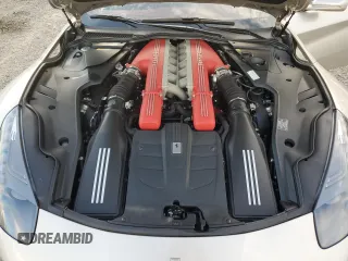 2014 Ferrari F12 z VIN ZFF74UFAXE0202704, wystawiony jako Copart lot #73676684 z przebiegiem Nie podano mil oraz Szkody całkowita. Historia ofert i sprzedaży dostępna na DreamBid. Obrazek 11.