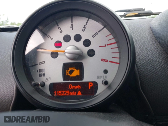 2014 MINI Countryman S with VIN WMWZC5C52EWP38659, listed as a IAAI auction lot 42229976 with 115,229 mi miles and . Bid and sale history available at DreamBid. Image 7.