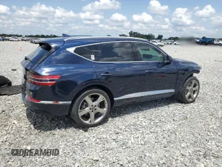 2022 Genesis GV80 z VIN KMUHCESC8NU100536, wystawiony jako Copart lot #56201335 z przebiegiem 23 427 mil mil oraz Szkody całkowita. Historia ofert i sprzedaży dostępna na DreamBid. Obrazek 3.