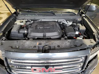 2015 GMC Canyon 4WD SLE with VIN 1GTG6BE37F1118335, listed as a Copart auction lot 85271264 with 58,679 mi miles and Salvage Title. Bid and sale history available at carsss.com. Image 12.