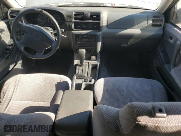 1999 Isuzu Rodeo S with VIN 4S2CK58W7X4357910, listed as a Copart auction lot 86955254 with 105,593 mi miles and Salvage Title. Bid and sale history available at DreamBid. Image 8.