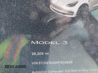 2023 Tesla Model 3 with VIN 5YJ3E1EA5PF505856, listed as a IAAI auction lot 41885837 with 28,206 mi miles and . Bid and sale history available at carsss.com. Image 14.