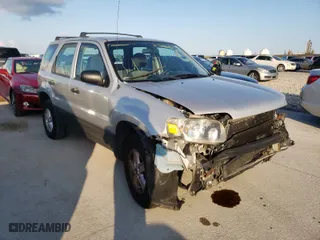 2005 Ford Escape XLS Value with VIN 1FMYU02Z75KB13387, listed as a Copart auction lot 40399594 with 148,579 mi miles and Salvage Title. Bid and sale history available at carsss.com. Image 1.