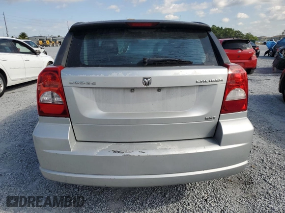 2009 Dodge Caliber SXT with VIN 1B3HB48AX9D157186, listed as a Copart auction lot 52892065 with 218,024 mi miles and Salvage Title. Bid and sale history available at carsss.com. Image 6.