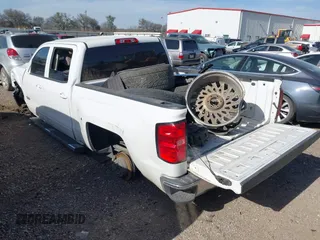 2018 Chevrolet Silverado 1500 LT with VIN 3GCUCRER0JG286336, listed as a IAAI auction lot 41738980 with 124,612 mi miles and . Bid and sale history available at DreamBid. Image 3.