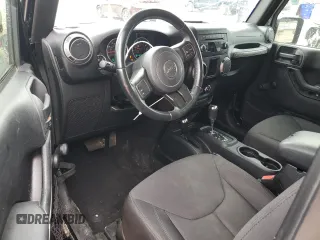 2015 Jeep Wrangler Sport with VIN 1C4AJWAG7FL576076, listed as a Copart auction lot 84072324 with 100,119 mi miles and Salvage Title. Bid and sale history available at carsss.com. Image 8.